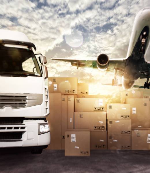 Truck and aircraft in a deposit with packages ready to start to deliver